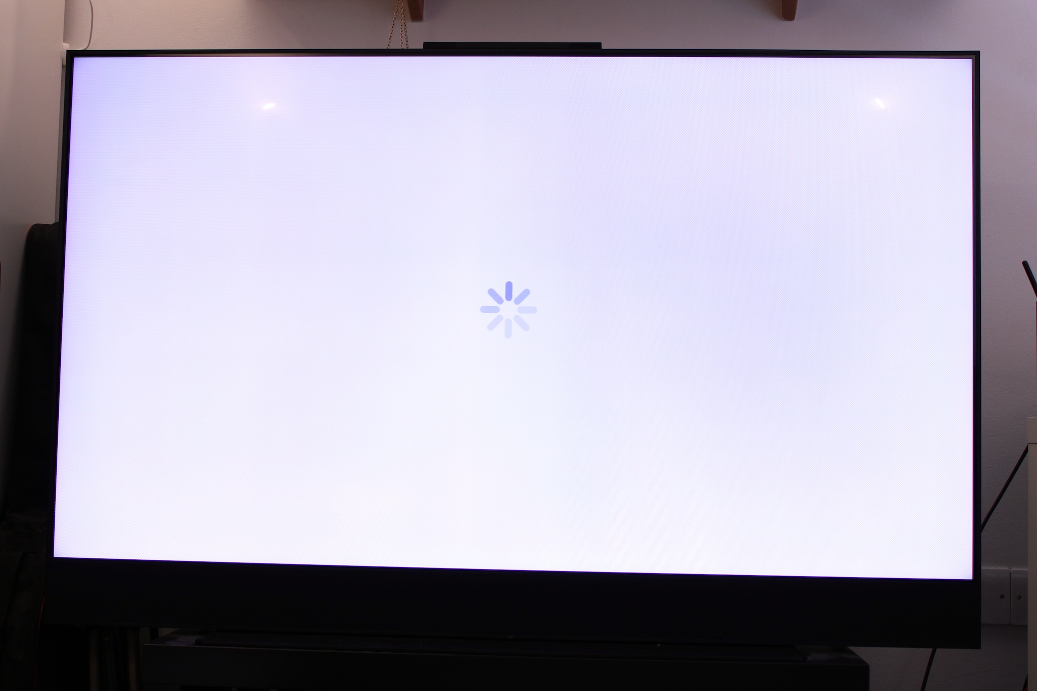 A TV showing the spinning buffering wheel of doom.